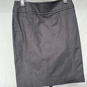 Club Monaco (2) black pencil skirt with double kick pleat.